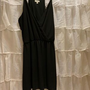 Black spaghetti strapped Charming Charlie dress.